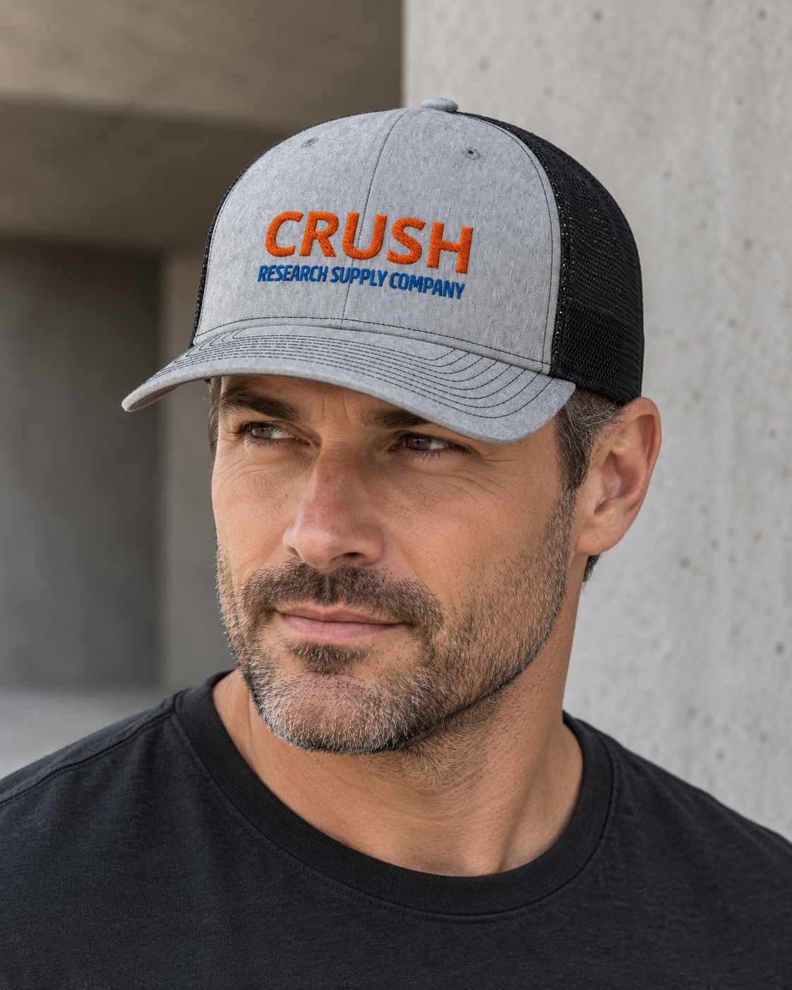 Model wearing CRUSH Research Supply Company trucker