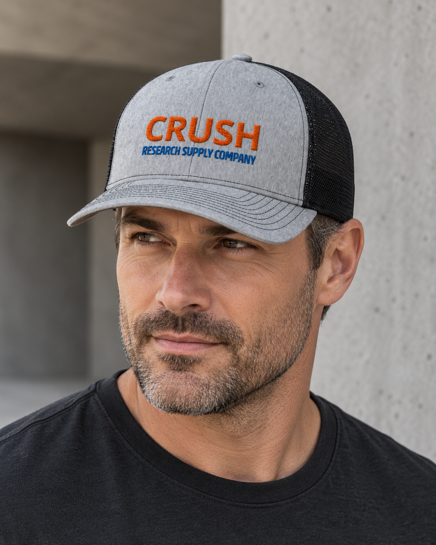 Model wearing CRUSH Research Supply Company trucker