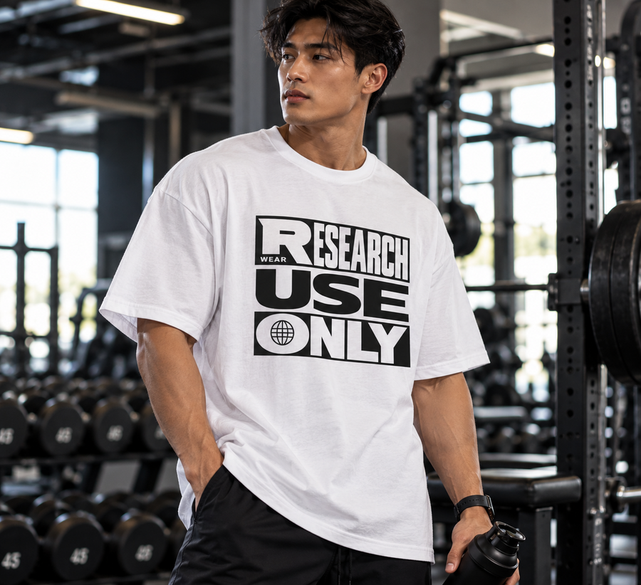 Man wearing the white Research Use Only oversized tee